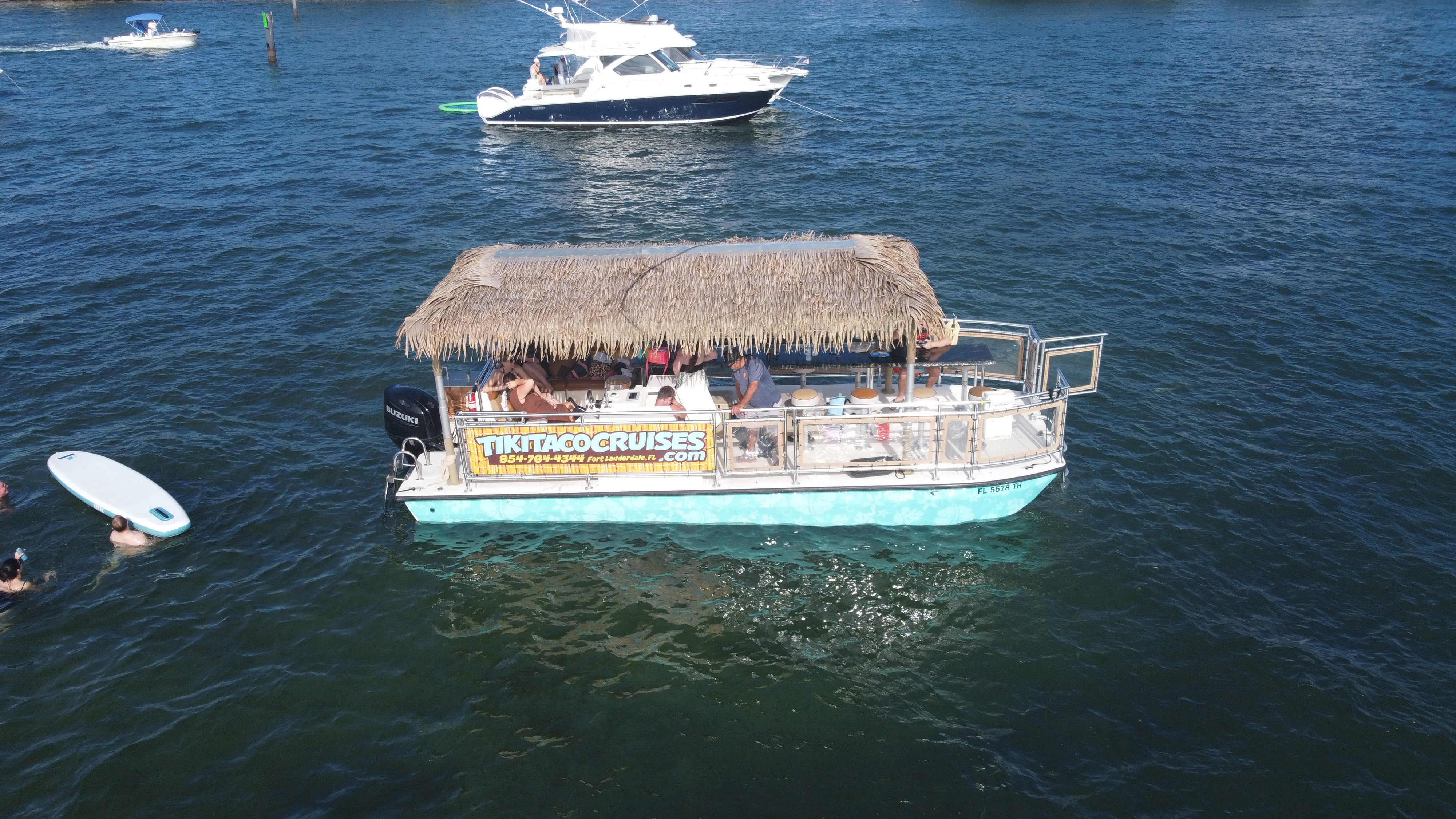 Tiki Taco boat experience on the water